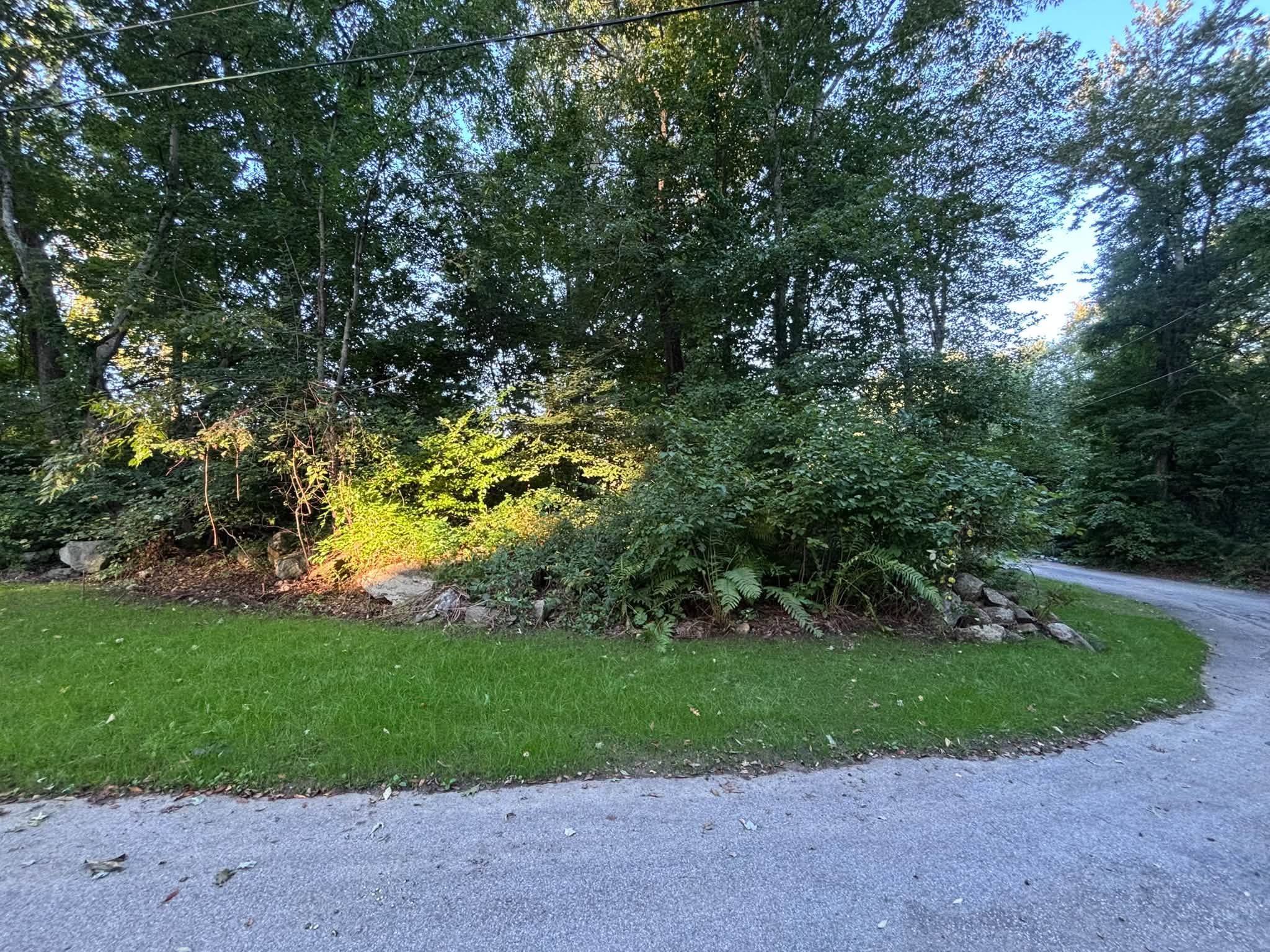 After — graded hillside with mulch and loam, Spencer MA